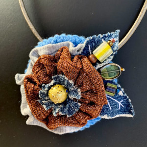Flower necklace brooch in denim and brown